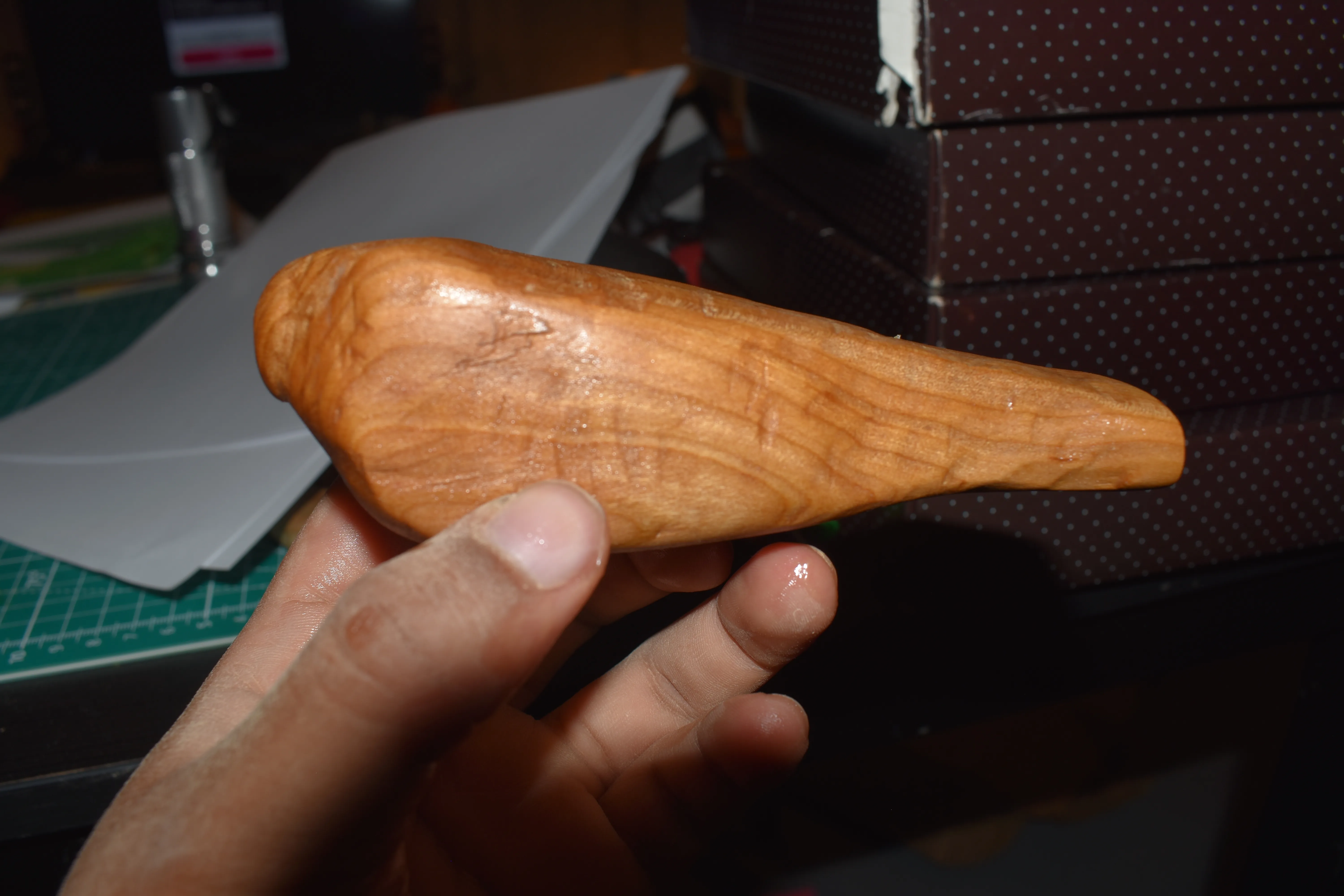 finished product of my oiled and sanded whittled bird
